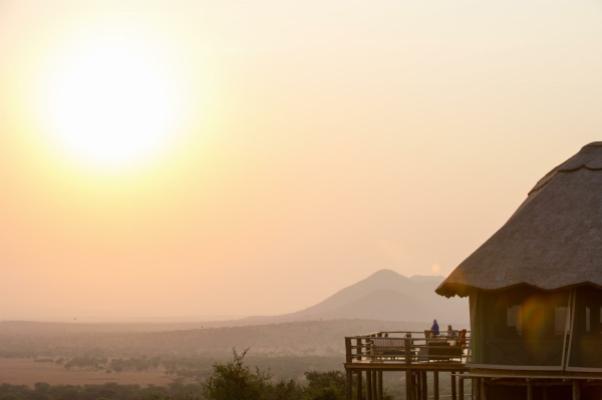 Sunrise over the Serengeti from a tent deck at Kubu Kubu Tented Lodge