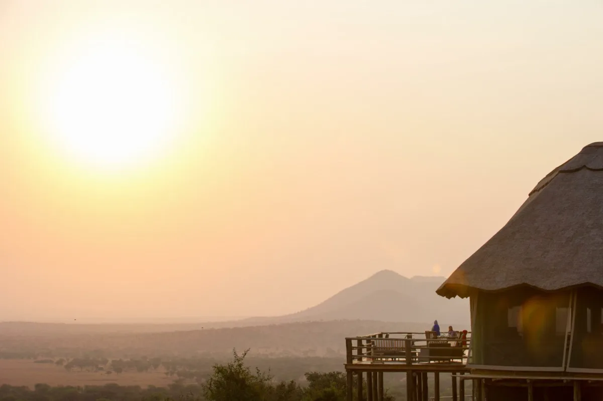 Sunrise over the Serengeti from a tent deck at Kubu Kubu Tented Lodge