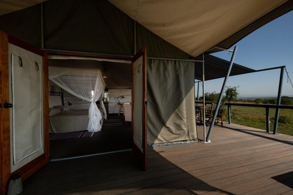 Safari tent on a raised wooden platform at Mara Mara Tented Lodge
