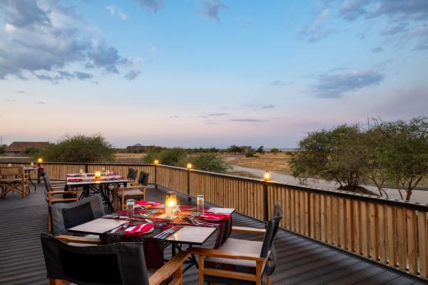 Dining deck overlooking Lake Burunge at Lake Burunge Baobab South Lodge