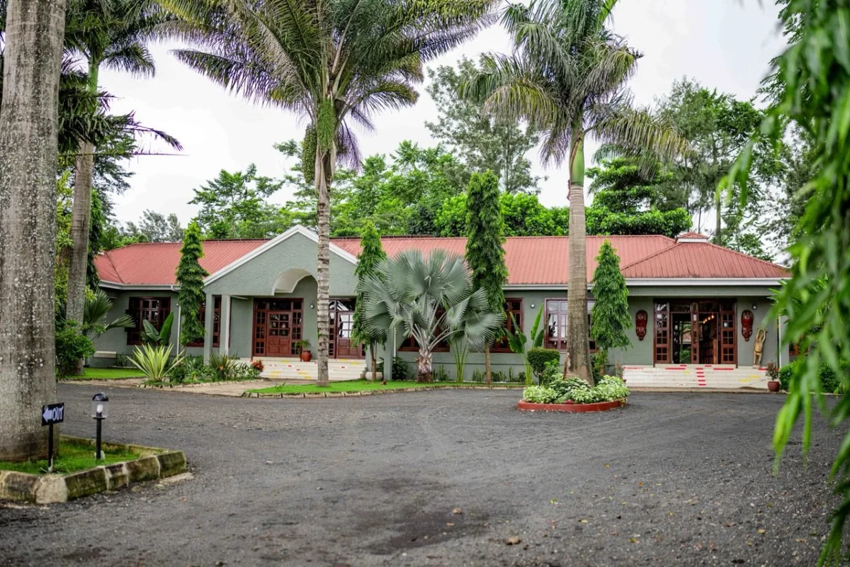 Main building and gardens at Arusha Planet Lodge