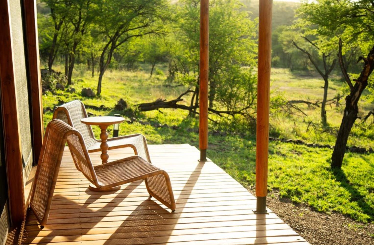 Tent veranda overlooking the bush at Luwela Camp, central Serengeti