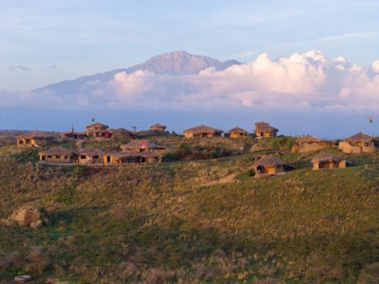 Osiligilai Maasai Lodge with Mount Kilimanjaro behind