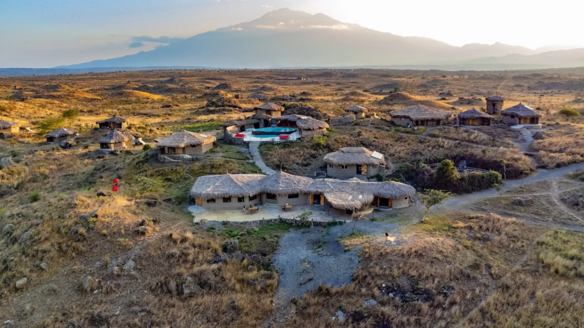 Aerial view of Osiligilai Maasai Lodge and Kilimanjaro