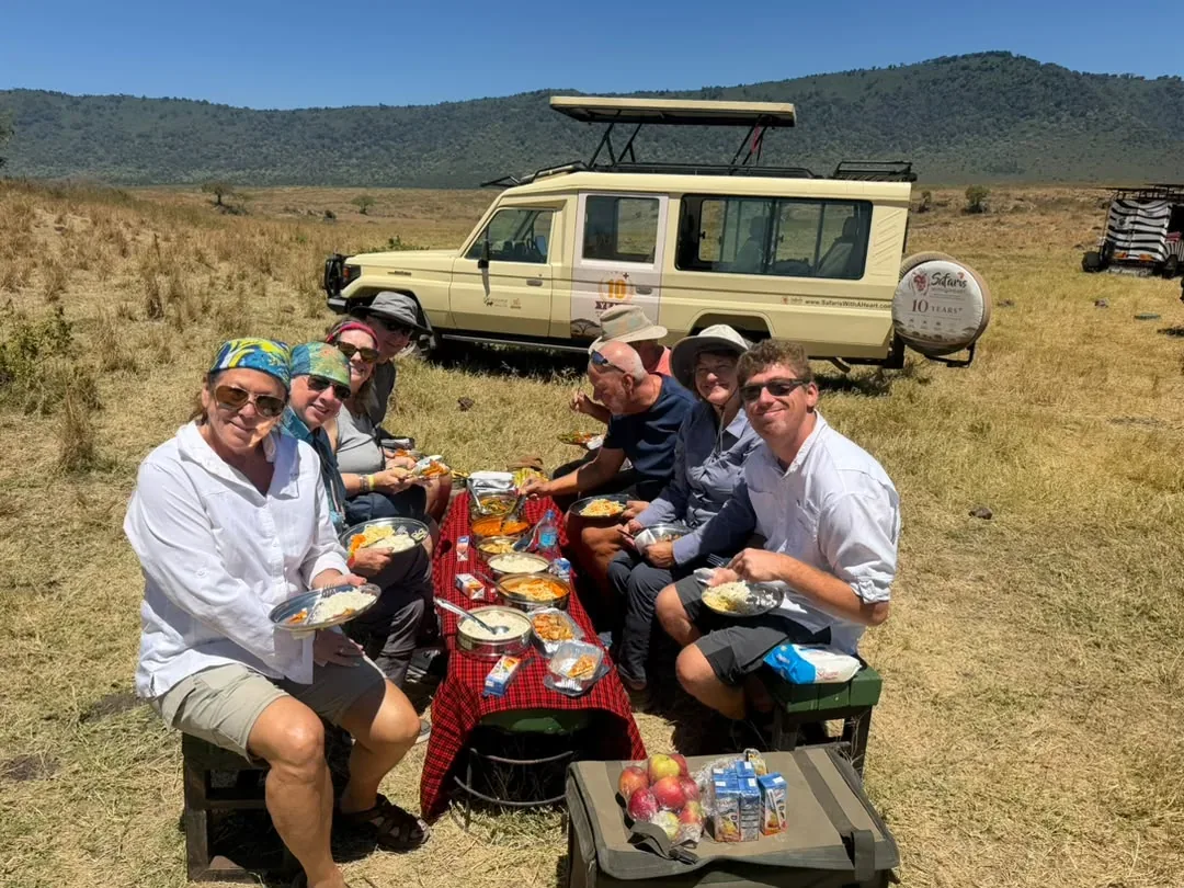 Southern Serengeti, Ngorongoro Crater and Lake Manyara – 8 Days – A colourful bush breakfast laid out for guests on the plains