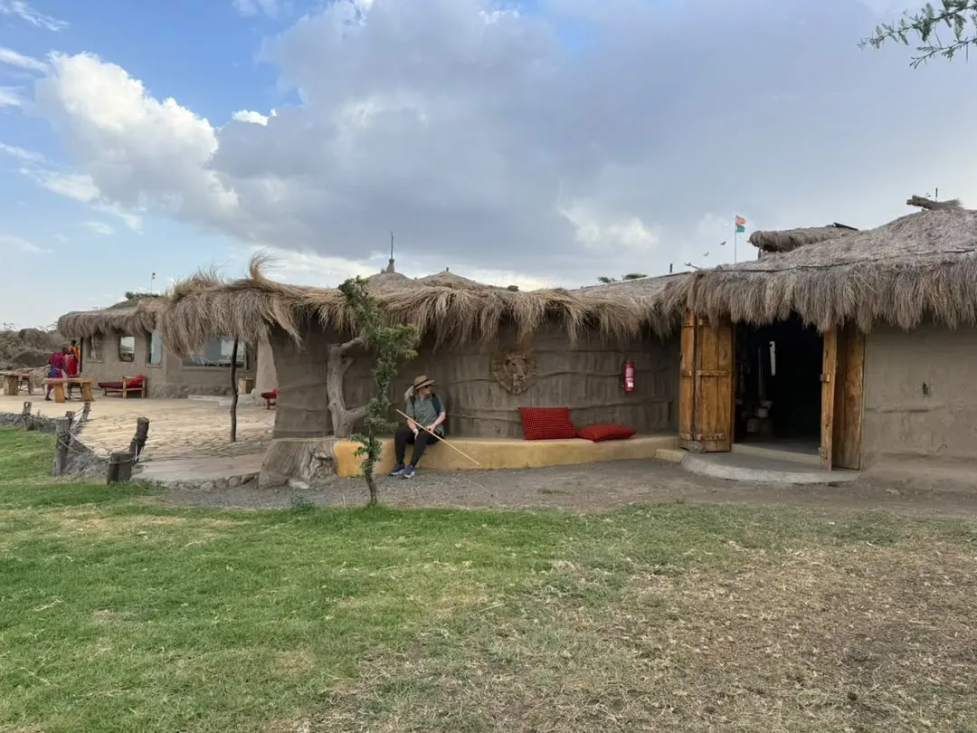 Thatched mud-walled cottages at Osiligilai Maasai Lodge