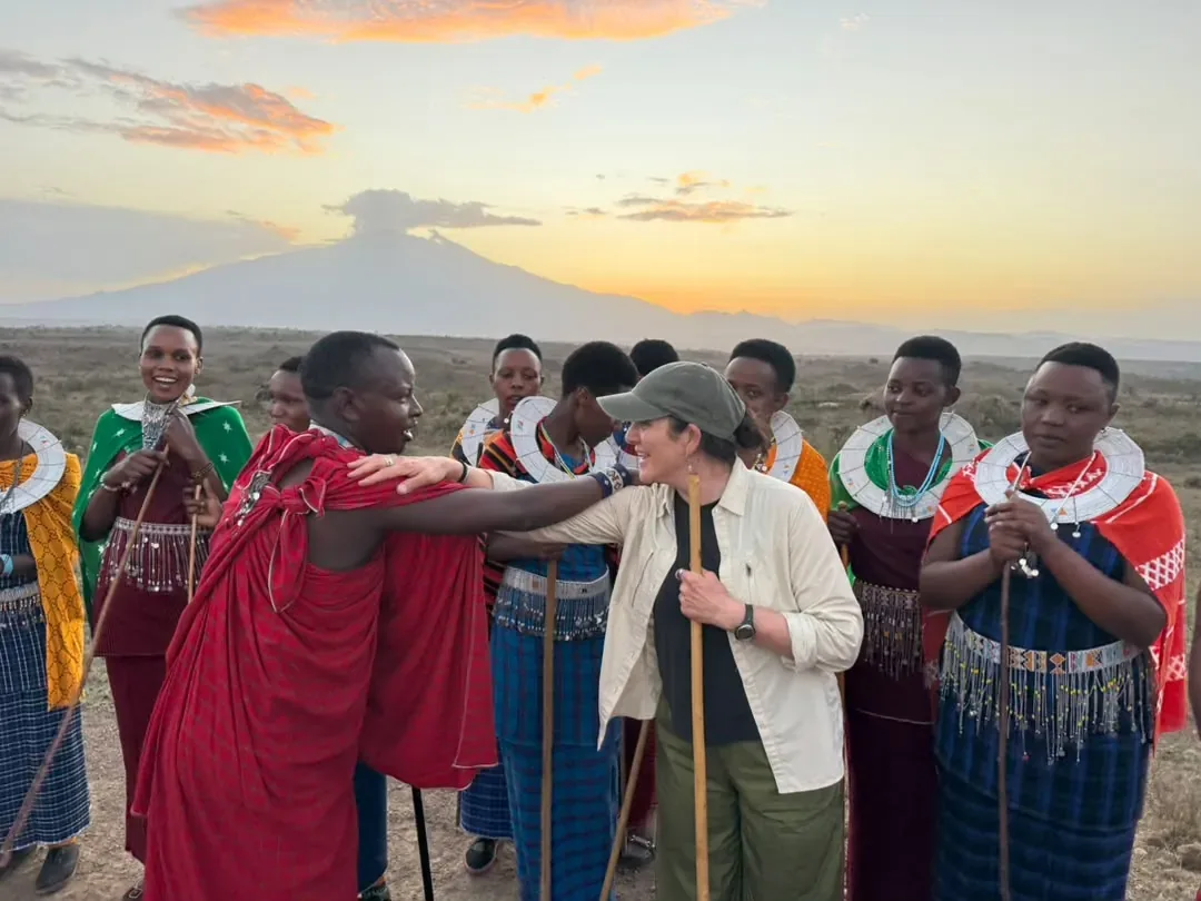 Osiligilai – Maasai women in beaded collars welcoming a guest at sunset